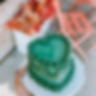 Green heart cake with vintage piping